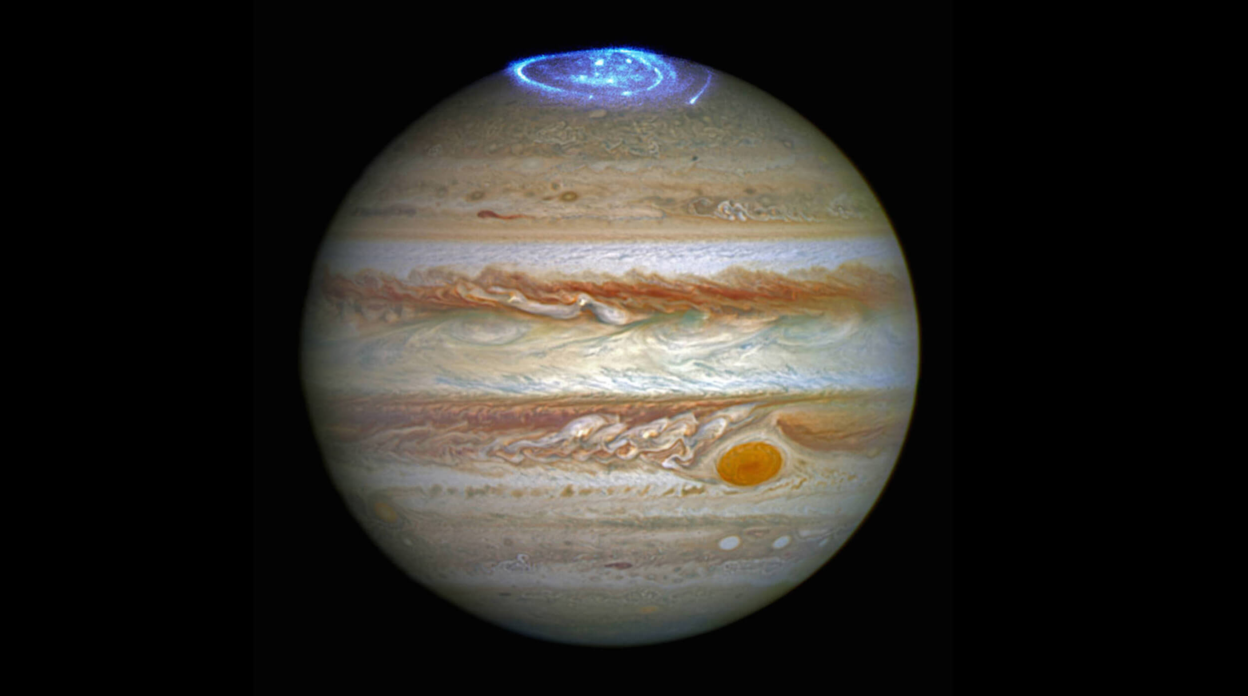Северное сияние на полюсах Юпитера, фотография Хаббла